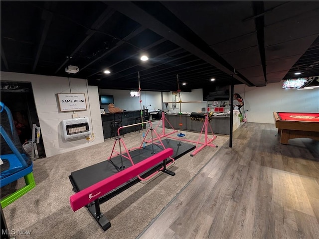 3439 Rough And Ready Rd, New Concord, OH 43762 - game room with heating unit, a fireplace, wood finished floors, and billiards