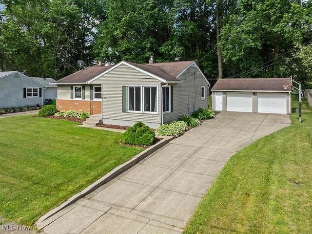 4000 Kenneth Rd, Stow, OH 44224 - ranch-style home featuring an outbuilding, a garage, a front yard, and brick siding