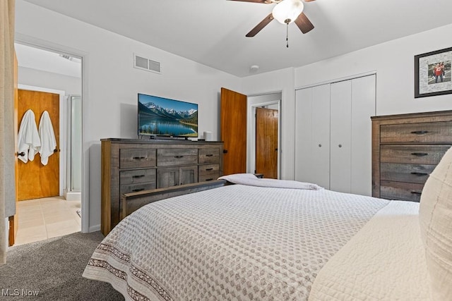 4000 Kenneth Rd, Stow, OH 44224 - carpeted bedroom with a closet, a ceiling fan, ensuite bathroom, and tile patterned floors