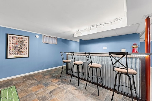 4000 Kenneth Rd, Stow, OH 44224 - indoor dry bar featuring baseboards and stone finish floors
