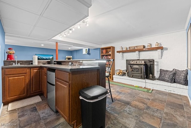 4000 Kenneth Rd, Stow, OH 44224 - kitchen with dark stone finish flooring, open shelves, brown cabinets, dark countertops, and freestanding refrigerator