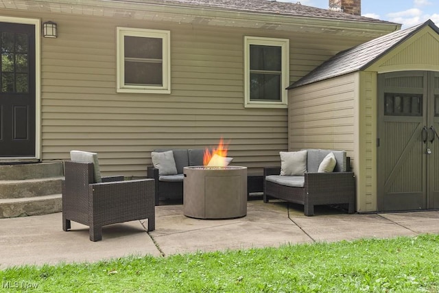 4000 Kenneth Rd, Stow, OH 44224 - view of patio / terrace with entry steps, an outdoor living space with a fire pit, and a shed