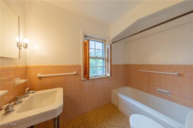 3526 Raymont Blvd, University Heights, OH 44118 - bathroom featuring tile walls, wainscoting, and tile patterned floors