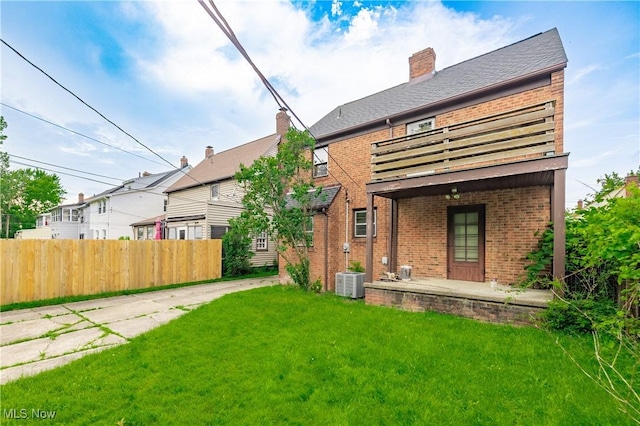 3526 Raymont Blvd, University Heights, OH 44118 - back of property featuring brick siding, a balcony, and a chimney