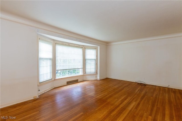 3526 Raymont Blvd, University Heights, OH 44118 - spare room featuring wood finished floors and baseboards