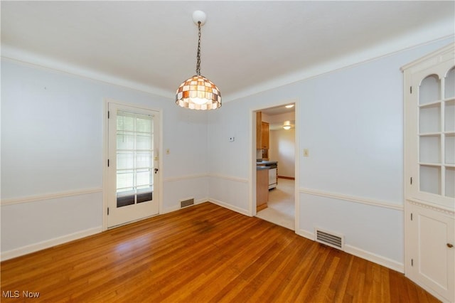 3526 Raymont Blvd, University Heights, OH 44118 - empty room featuring wood finished floors and baseboards