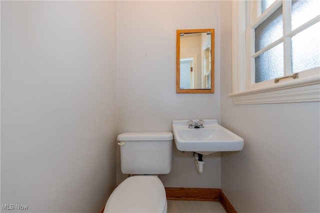 3526 Raymont Blvd, University Heights, OH 44118 - half bathroom featuring toilet and baseboards
