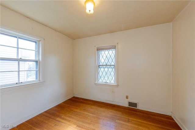 3526 Raymont Blvd, University Heights, OH 44118 - spare room with plenty of natural light and light wood finished floors