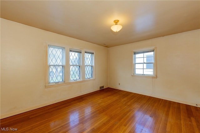 3526 Raymont Blvd, University Heights, OH 44118 - empty room with hardwood / wood-style flooring and baseboards