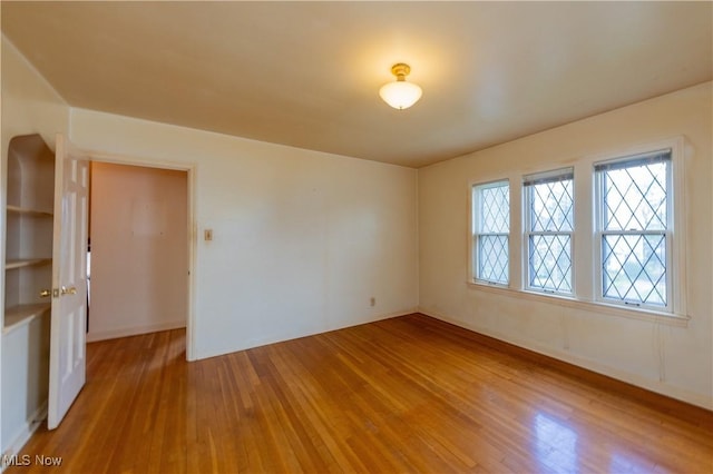 3526 Raymont Blvd, University Heights, OH 44118 - unfurnished room featuring wood-type flooring