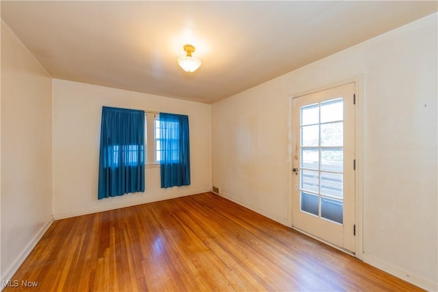 3526 Raymont Blvd, University Heights, OH 44118 - spare room featuring wood finished floors and plenty of natural light