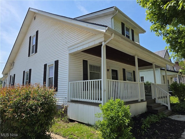 417 W Main St, Scio, OH 43988 - view of side of home with a porch