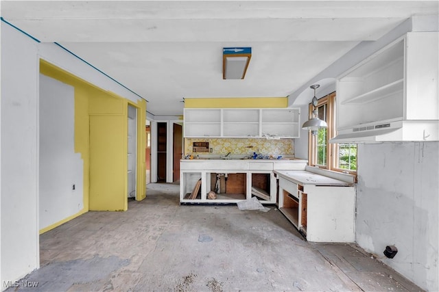 202 N State St, Rochester, OH 44090 - interior space with open shelves, white cabinetry, and backsplash
