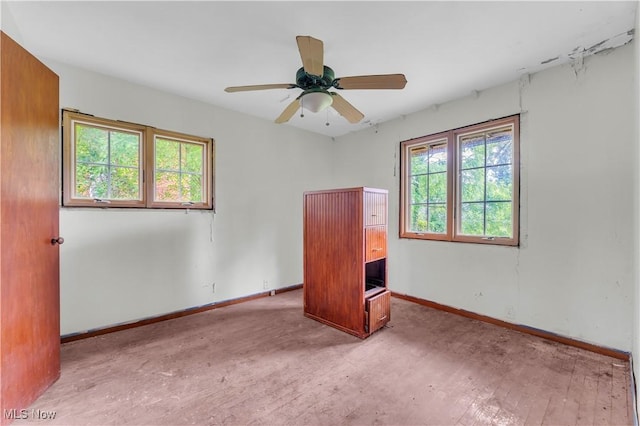 202 N State St, Rochester, OH 44090 - spare room with wood finished floors and ceiling fan