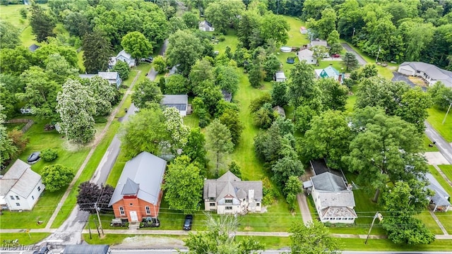 202 N State St, Rochester, OH 44090 - aerial perspective of suburban area featuring a tree filled landscape