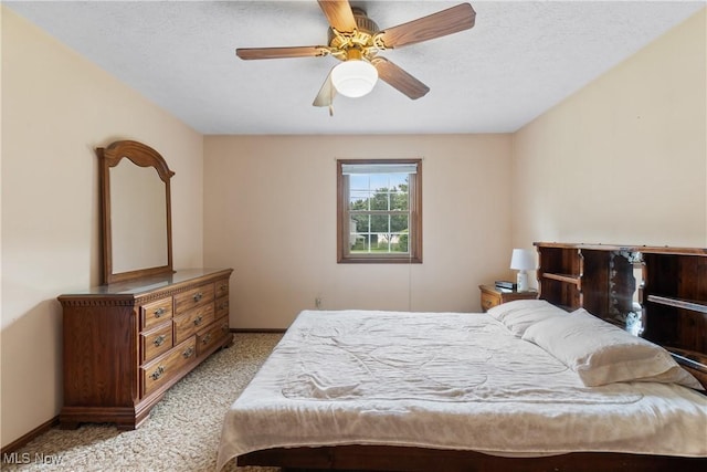 8471 Henry St, Navarre, OH 44662 - bedroom featuring light carpet and a ceiling fan