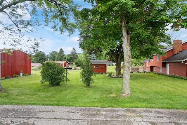 8471 Henry St, Navarre, OH 44662 - view of green lawn with a storage shed