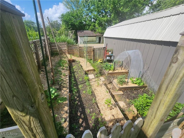4495 Old River Rd, Philo, OH 43771 - fenced backyard with a garden