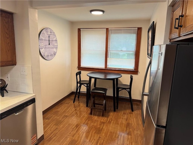783 Jason Ave, Akron, OH 44314 - dining area featuring wood finished floors and baseboards