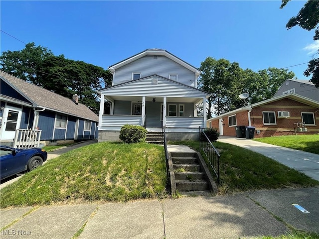 783 Jason Ave, Akron, OH 44314 - view of front of home with covered porch and a front lawn