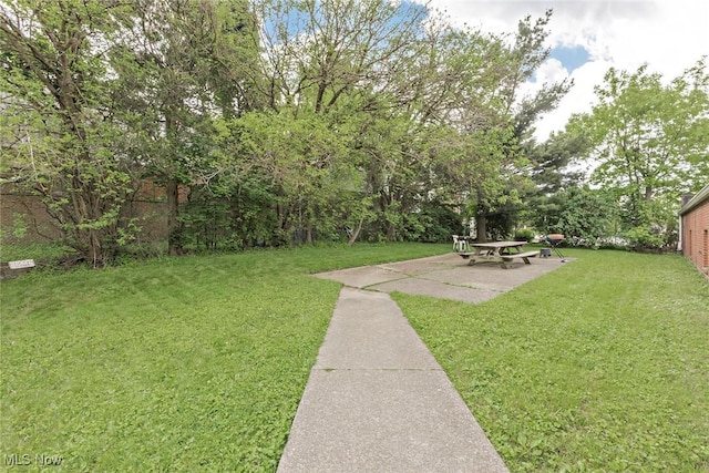 3271 Warrensville Center Rd Unit 4A, Shaker Heights, OH 44122 - view of grassy yard with a patio