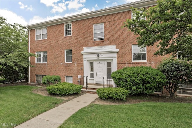 3271 Warrensville Center Rd Unit 4A, Shaker Heights, OH 44122 - view of front facade featuring a front lawn and brick siding