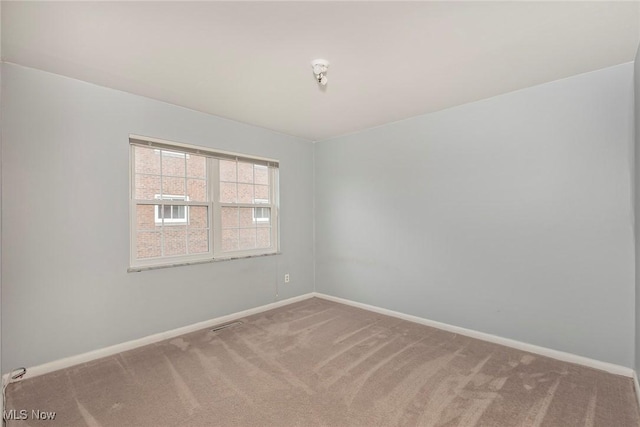 3271 Warrensville Center Rd Unit 4A, Shaker Heights, OH 44122 - unfurnished room with carpet flooring and baseboards