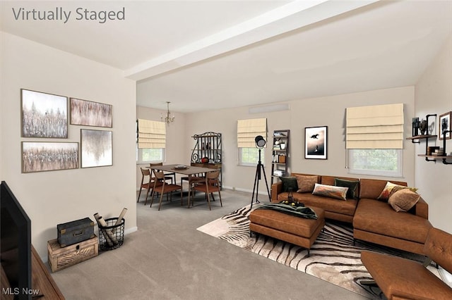 3271 Warrensville Center Rd Unit 4A, Shaker Heights, OH 44122 - carpeted living room featuring a chandelier and baseboards