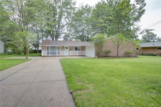 2764 Walter Rd, Westlake, OH 44145 - single story home featuring covered porch, concrete driveway, and a front yard