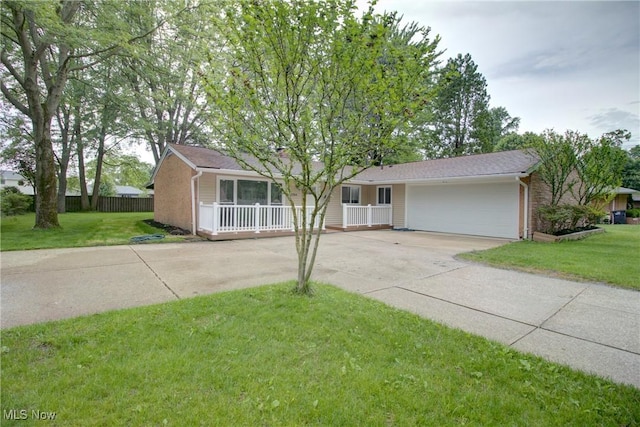 2764 Walter Rd, Westlake, OH 44145 - single story home with concrete driveway, an attached garage, a porch, and brick siding