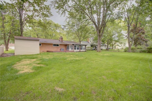 2764 Walter Rd, Westlake, OH 44145 - view of green lawn with a sunroom