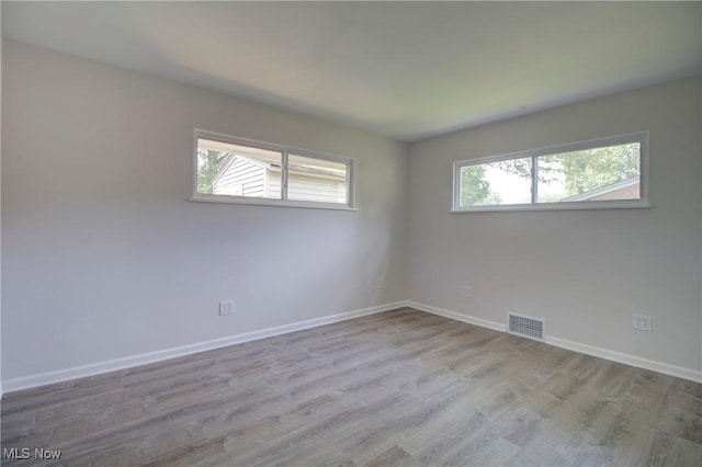 2764 Walter Rd, Westlake, OH 44145 - spare room with plenty of natural light and wood finished floors