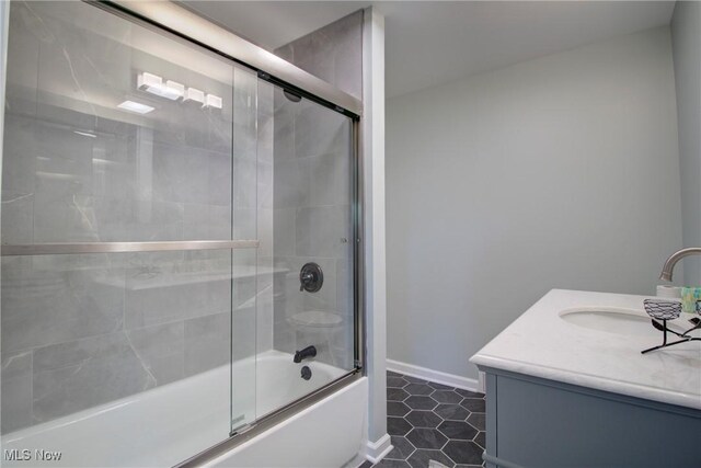 2764 Walter Rd, Westlake, OH 44145 - bathroom featuring vanity, bath / shower combo with glass door, and tile patterned flooring