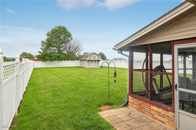 1455 Buckeye Cir, Salem, OH 44460 - fenced backyard featuring a storage unit and a sunroom