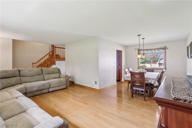 1455 Buckeye Cir, Salem, OH 44460 - living room with light wood-style flooring and stairway