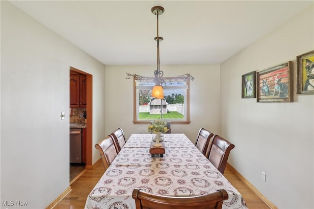 1455 Buckeye Cir, Salem, OH 44460 - dining area featuring wood finished floors and baseboards
