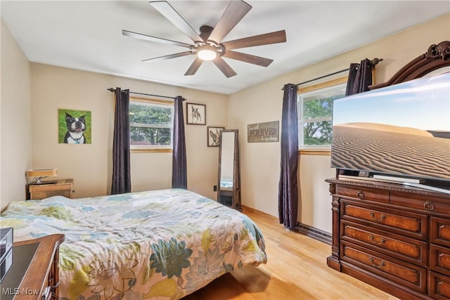1455 Buckeye Cir, Salem, OH 44460 - bedroom with light wood-type flooring and ceiling fan