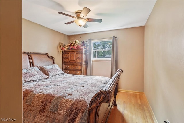 1455 Buckeye Cir, Salem, OH 44460 - bedroom with wood finished floors and ceiling fan