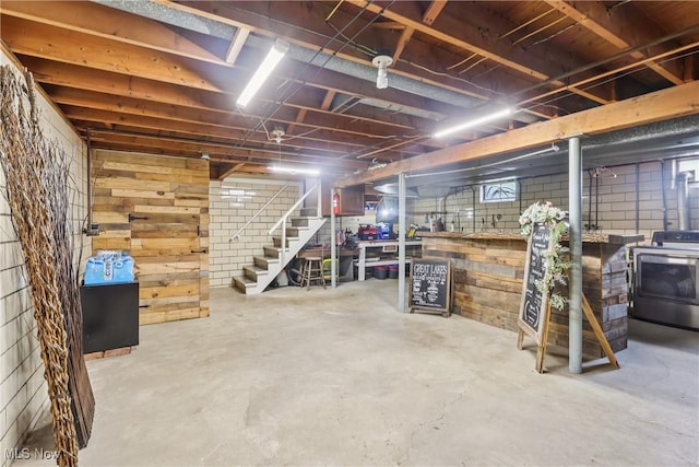 1455 Buckeye Cir, Salem, OH 44460 - unfinished basement with washer / dryer, stairs, and wood walls