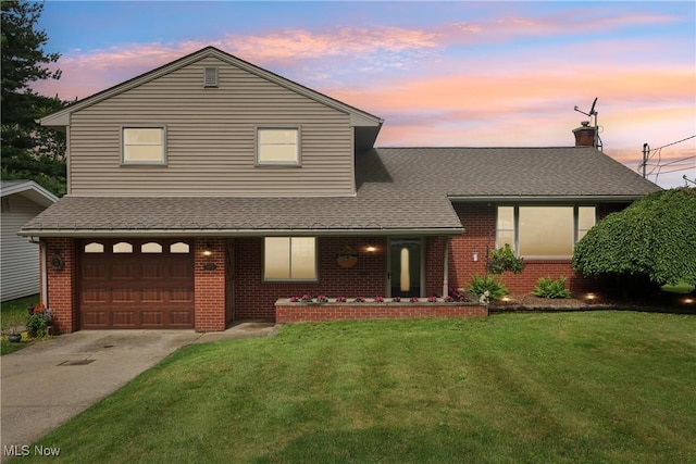 1455 Buckeye Cir, Salem, OH 44460 - view of front of property featuring brick siding, a front lawn, and concrete driveway