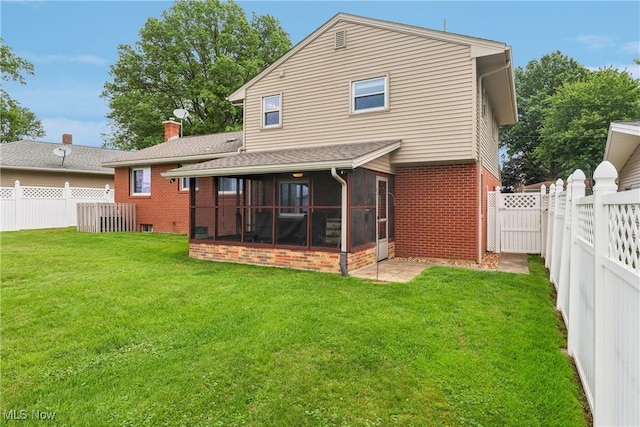 1455 Buckeye Cir, Salem, OH 44460 - back of property featuring brick siding, a sunroom, and a fenced backyard
