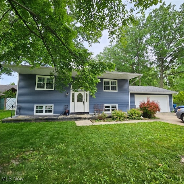 845 Dunny Ave, Sheffield Lake, OH 44054 - view of front facade featuring concrete driveway