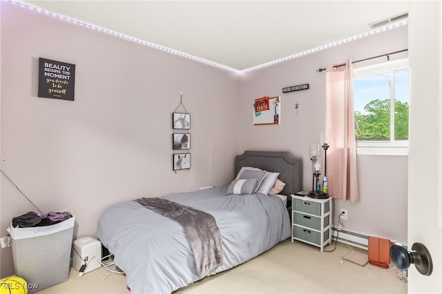 845 Dunny Ave, Sheffield Lake, OH 44054 - carpeted bedroom featuring baseboard heating
