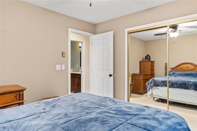 845 Dunny Ave, Sheffield Lake, OH 44054 - carpeted bedroom with a ceiling fan and a closet