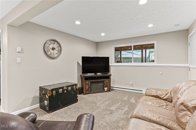 845 Dunny Ave, Sheffield Lake, OH 44054 - living room featuring a baseboard heating unit, carpet floors, recessed lighting, and a glass covered fireplace