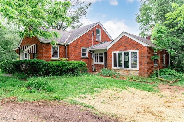 9509 Reed Rd, Columbia Station, OH 44028 - view of front of property with a chimney and brick siding
