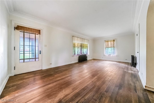 9509 Reed Rd, Columbia Station, OH 44028 - unfurnished living room with ornamental molding and hardwood / wood-style flooring