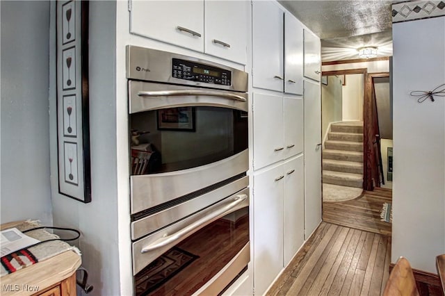3366 Darrow Rd, Stow, OH 44224 - kitchen featuring white cabinets and light wood finished floors
