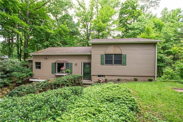 3366 Darrow Rd, Stow, OH 44224 - rear view of property with a lawn