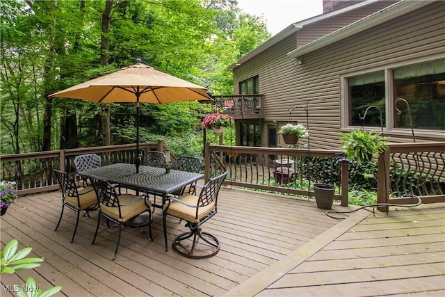 3366 Darrow Rd, Stow, OH 44224 - wooden deck with outdoor dining space